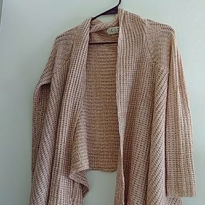 A beautiful light pink cardigan